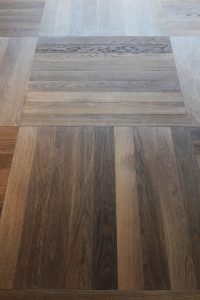 A close-up view of the large parquet installation.