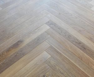 The Chevron pattern utilized in this room accentuates the degree of detail in which the client selected finishes throughout the home.