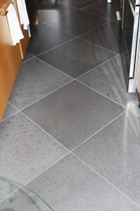 Larger tiles were installed in a diamond pattern to stray from the norm.