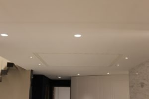 A dental detail was created to break up the large ceiling and add yet another design detail to this magnificent residence.