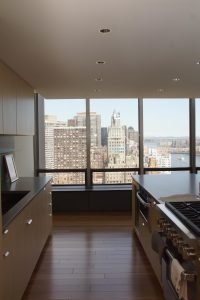The chef is easily distracted in this kitchen where his/her gaze can quickly be averted to the city skyline or East River.